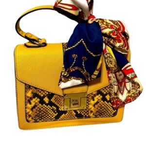 Aldo bag with scarf. Mustard color w/faux snake skin. Comes w/detachable strap